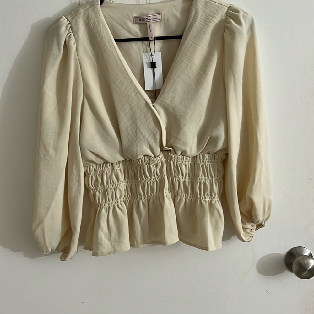 tan blouse